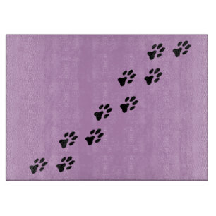 Paw Prints Across Purple Glass Cutting Board