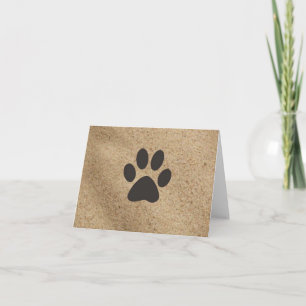 Paw prints in the sand card