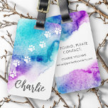 Paw prints purple aqua blue watercolor paint luggage tag<br><div class="desc">Luggage tag featuring white paw prints on a purple and aqua blue watercolor paint splash and your custom name.</div>