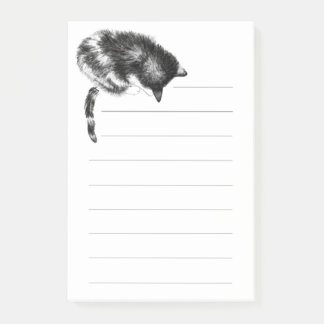 Pawing cat note pad