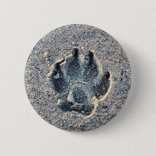 PAWPRINT IN THE SAND    2 INCH ROUND BUTTON