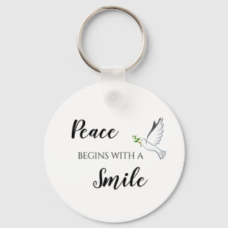 Peace begins with a smile dove quote keychain