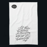 Peace in this Home Kitchen Towel<br><div class="desc">Bring peace to your kitchen with this sweet hand lettered hand towel. When folded in half,  the phrase on the front reads “let there be peace in this home and let it begin with me”. Reverse side has a small bubble with the wording “peace (& quiet)”.</div>