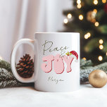 Peace Joy Christmas Pink Red Festive Add Name   Coffee Mug<br><div class="desc">This cute, girly Peace & Joy design was created using a fun modern script font and my hand lettered block font in a retro 80's style in pale pink and red. It features my hand painted Santa hat with holly and berries for a festive holiday look. Add your name to...</div>