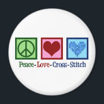 Peace Love Cross Stitch Magnet<br><div class="desc">Cute cross stitching gift for someone who loves to create things. This Peace Love Cross Stitch gift features a peace sign, heart, and a pretty cross-stitch pattern heart.</div>