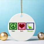 Peace Love Dinosaurs Ceramic Ornament<br><div class="desc">A peace sign,  red heart,  and an awesome green dinosaur. I love cool dinosaur gifts for paleontologists or kids who like prehistoric animals.</div>