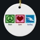 Peace Love Surfing Ceramic Ornament<br><div class="desc">A peace sign,  heart,  and the beautiful ocean surf. A great gift for a surfer.</div>