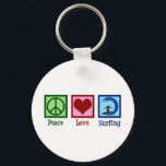Peace Love Surfing Keychain<br><div class="desc">Peace Love Surfing Gift. An awesome surfing design with a peace sign, heart, and a cool surfer on a surfboard riding blue waves. I love going to the ocean when the surf is wild.</div>