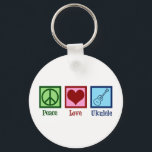 Peace Love Ukulele Keychain<br><div class="desc">Peace Love Ukulele. Cute ukuleles player gift featuring a cool peace sign,  heart,  and uke instrument.</div>