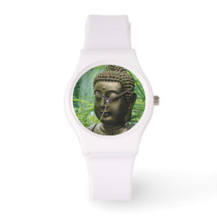 Peaceful Buddha Statue in a Leafy Green Forest Watch