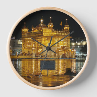 peaceful  view of golden temple  clock