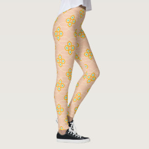 Peach background hexagonal floral pattern leggings