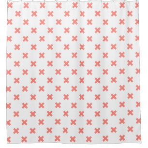 Peach cross stitches on white