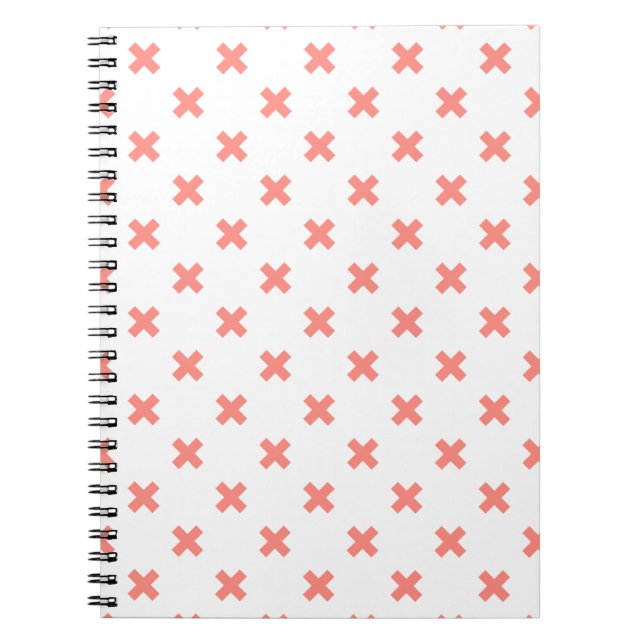 Peach cross stitches on white notebook (Front)