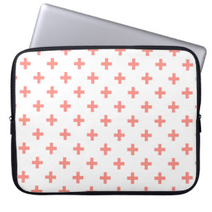 Peach polka crosses on white laptop sleeve