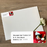 Peaches the Tuxedo Cat Christmas Address Labels<br><div class="desc">These return address labels feature Peaches the Tuxedo Cat wearing a Santa hat and bow looking up at you.  You can customize the design with your address.  Copyright Peaches the Tuxedo Cat</div>