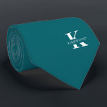 Peacock Blue | Elegant Monogram Name | One-Sided Tie<br><div class="desc">An elegant one-sided necktie featuring a bold white monogram across a Peacock Blue background. On top of this monogram sits your first or last name spelled out in all capitals. If you prefer a bolder look for the personal name inside of the large letter you can do the following: Use...</div>