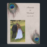 Peacock Feather Border Wedding Mini Binder<br><div class="desc">Pretty blue, tan, and green peacock feathers swirl around the top left and bottom right corners of this wedding memory binder. Your custom text is in brown in two text fields at the upper right. The images and text are placed on a distressed light grey tan background which complements the...</div>