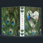 Peacock Wedding Binder<br><div class="desc">Customize this peacock design to put all your amazing wedding memorize inside. The beautiful peacock feather photography makes this a very unique design for this binder. Put your own wedding picture in the heart on the cover for an extra special binder. The bride and the groom on front would make...</div>