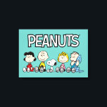 Peanuts Gang Sitting Together Canvas Print<br><div class="desc">Check out Lucy,  Charlie Brown,  Snoopy,  Sally,  and Linus sitting together in a row.</div>
