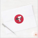 Peanuts | Snoopy Christmas Gift Giver Classic Round Sticker<br><div class="desc">Check out  this fun Peanuts Christmas design.</div>