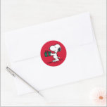 Peanuts | Snoopy Christmas Gift Giver Classic Round Sticker<br><div class="desc">Check out  this fun Peanuts Christmas design.</div>