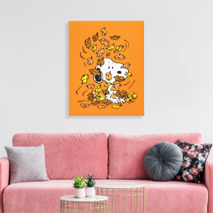 Peanuts   Snoopy Pile of Leaves Canvas Print