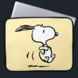 Peanuts | Snoopy Running Laptop Sleeve<br><div class="desc">Snoopy is the loveable pet beagle of Charlie Brown in the comic strip Peanuts by Charles M. Schulz. Check out this cute Peanuts design featuring this loveable dog.</div>