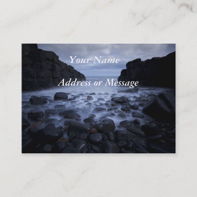 Pebbles and rocks along the ocean shoreline. busin business card (Front)