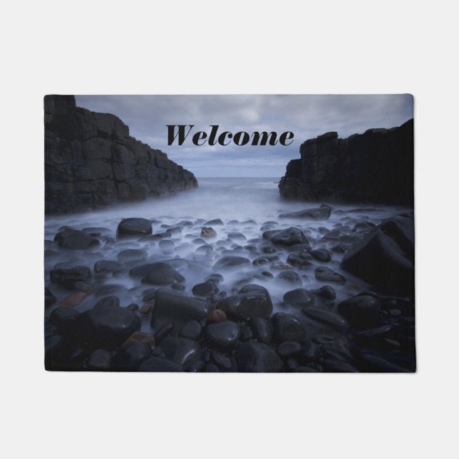 Pebbles and Rocks along the Ocean Shoreline Doorma Doormat (Front)