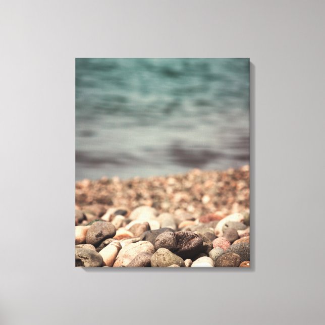 Pebbles on the beach canvas print (Front)
