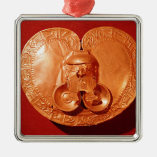 Pectoral with a human face metal ornament
