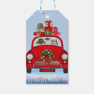Pekingese Dog In Car With Santa Claus Gift Tags