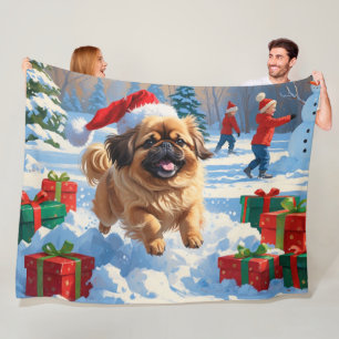 Pekingese Dog Running in Snow with Christmas Hat Fleece Blanket