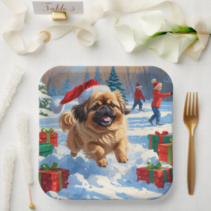 Pekingese Dog Running in Snow with Christmas Hat Paper Plate
