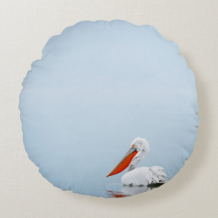 PELICAN ON BLUE WATER ROUND PILLOW