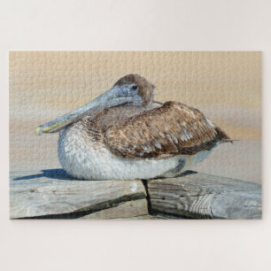 Pelican resting on fishing pier jigsaw puzzle