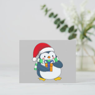 Penguin in a Christmas hat with a gift Pillar Can Announcement Postcard