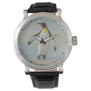 Penguin walking on the beach watch