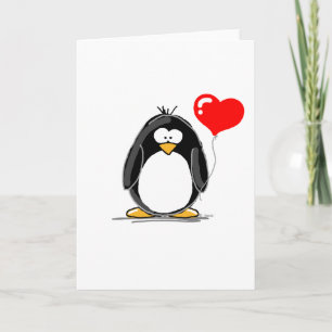 Penguin with a heart balloon holiday card