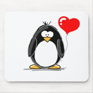 Penguin with a heart balloon mouse pad