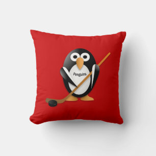 Penguin with a hockey stick throw pillow