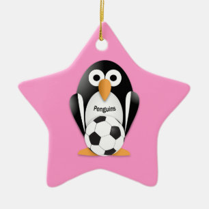 Penguin with a soccer ball ceramic ornament