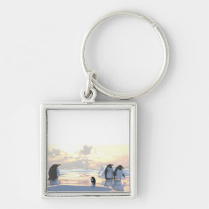 penguins chilling on an ice floe keychain