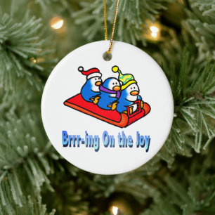 Penguins Sledding Winter Holiday Scene Ceramic Ornament