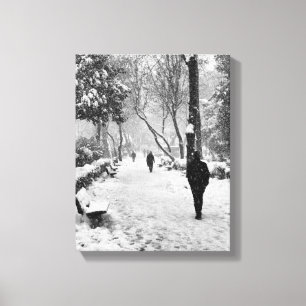 People at park in snowy winter day canvas print