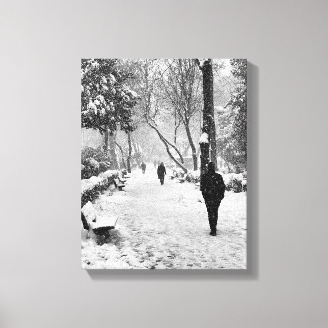 People at park in snowy winter day canvas print (Front)