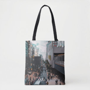 PEOPLE AT THE STREETS OF THE CITY DURING DAY TOTE BAG