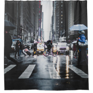 PEOPLE CROSSING PEDESTRIAN LANE IN CITY STREET