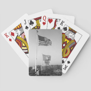 People in Bleachers Playing Cards